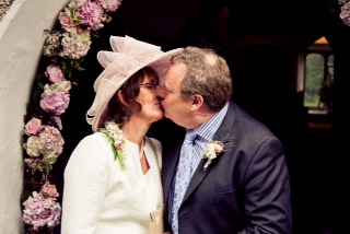 Simon and Diana recreate 'the kiss' outside the Church in the village of Grasmere