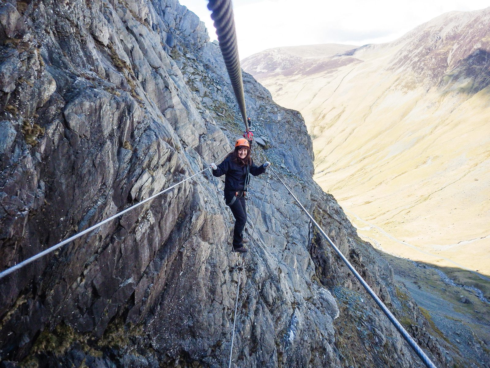 Tina's tightrope photo shoot on the 60 m Burma Bridge