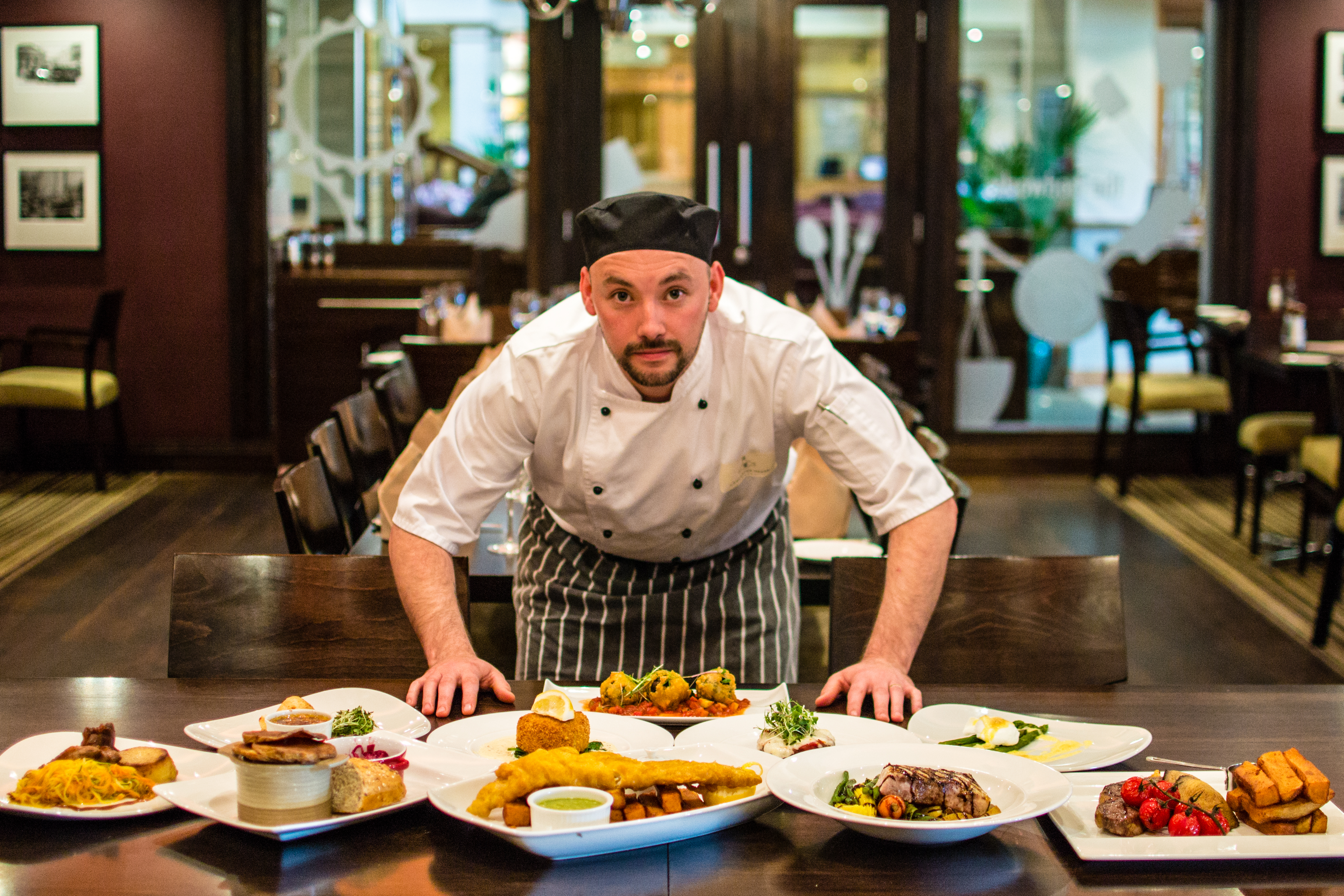 Head Chef, Damien, with a selection of dishes from the Lancaster House kitchen