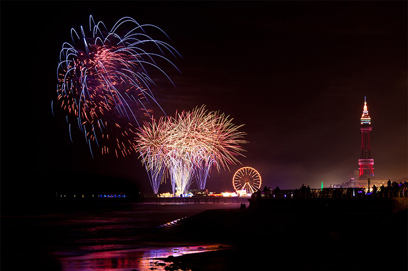 Fireworks at Blackpool with the tower and Ferris wheel in the background