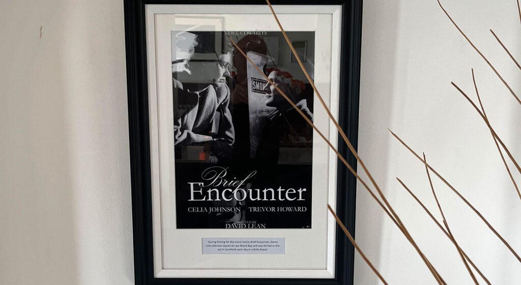 Framed copy of 'Brief Encounter' film poster.